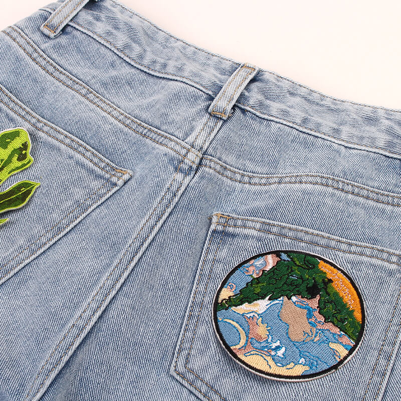 Peace and Beauty Patches Light Washed Jeans